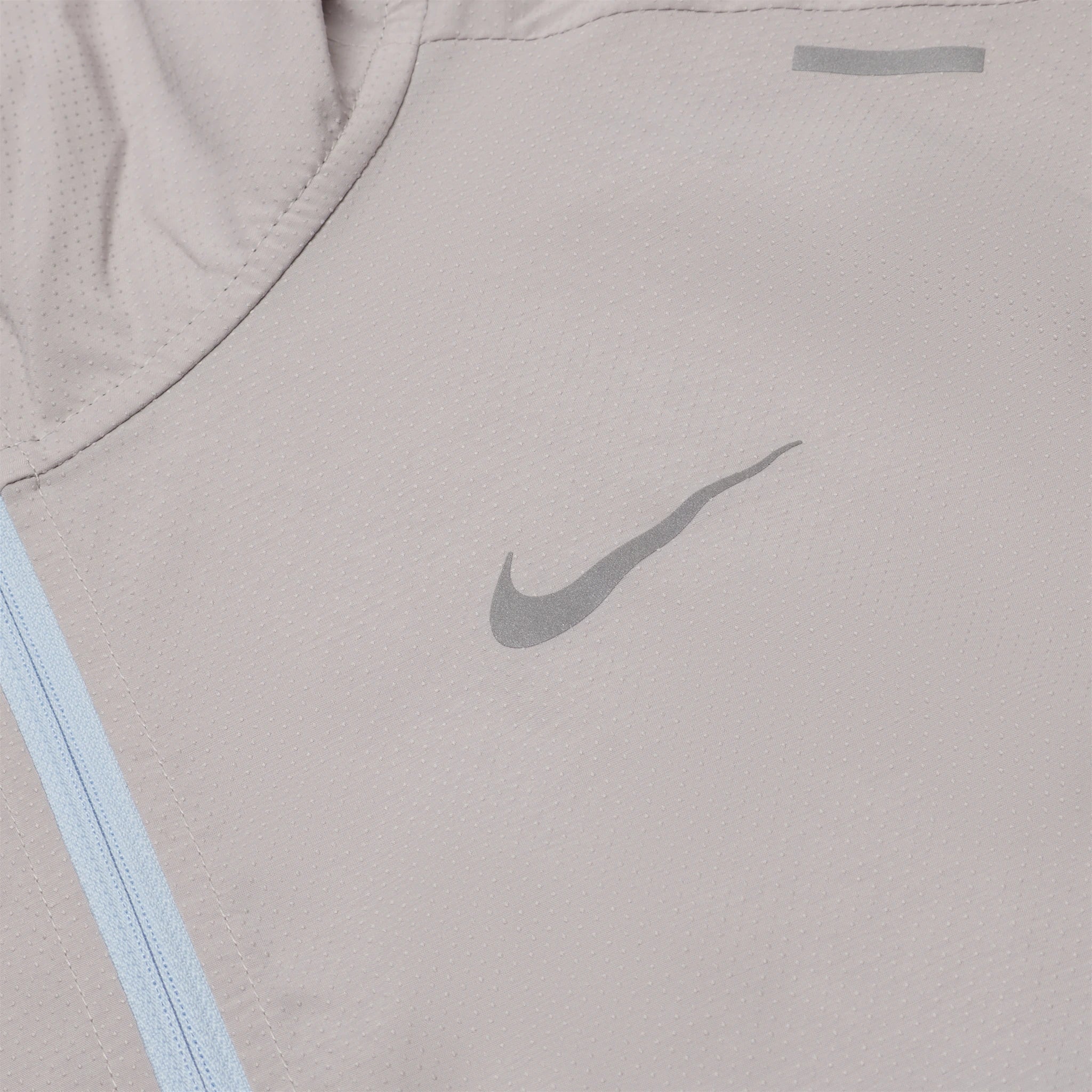Logo view of Nike Repel Packable Orange Brown Windrunner Jacket CZ9071-012